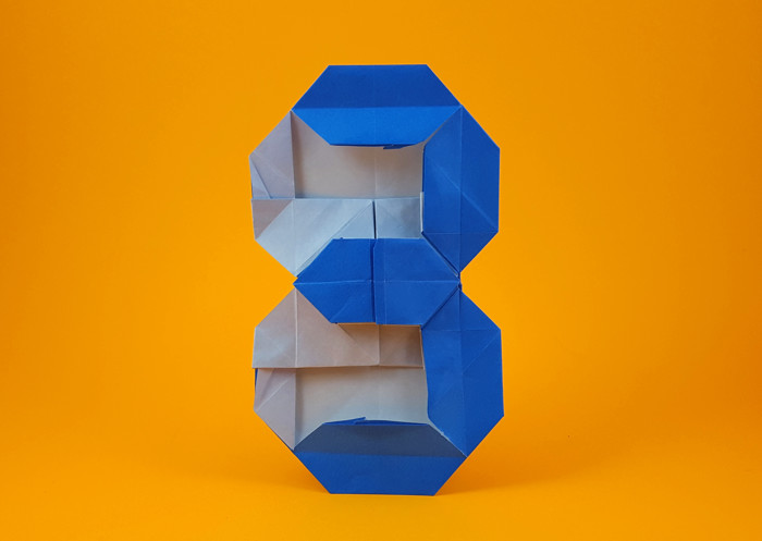 Origami 7-segment display by Mi Wu. Folded from a square of origami paper by Gilad Aharoni on giladorigami.com