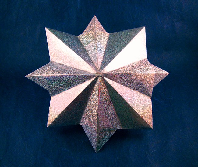 Origami Diamond by John Montroll. Folded from a square of holographic paper by Gilad Aharoni on giladorigami.com