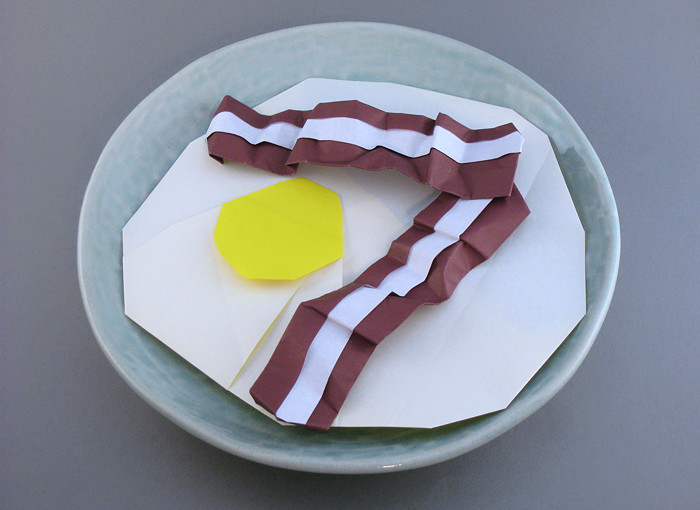 Origami Bacon by Peter Engel. Each folded from a square of origami paper by Gilad Aharoni on giladorigami.com