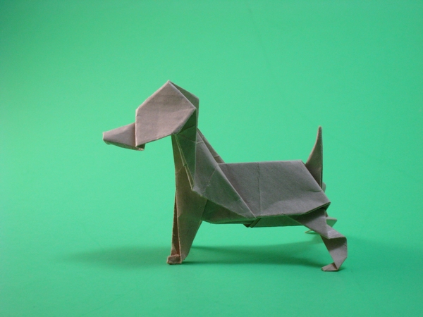 Origami Beagle by Kunihiko Kasahara. Folded from a triangle of Kraft origami paper by Gilad Aharoni on giladorigami.com
