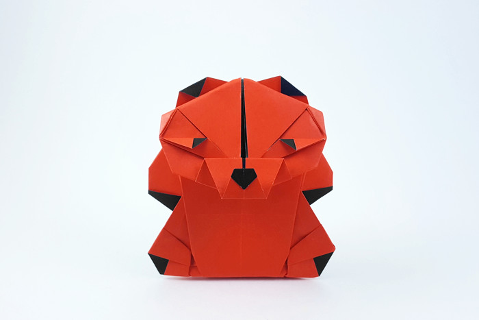 Origami Teddy bear by Marc Kirschenbaum. Folded from a square of Duo origami paper by Gilad Aharoni on giladorigami.com