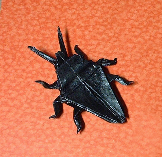 Origami Beetle by John Montroll. Folded from a square of origami paper by Gilad Aharoni on giladorigami.com