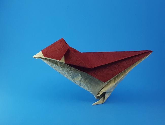 Origami Little bird by Jun Maekawa. Folded from a square of Crinkle Red scrapbooking paper by Gilad Aharoni on giladorigami.com