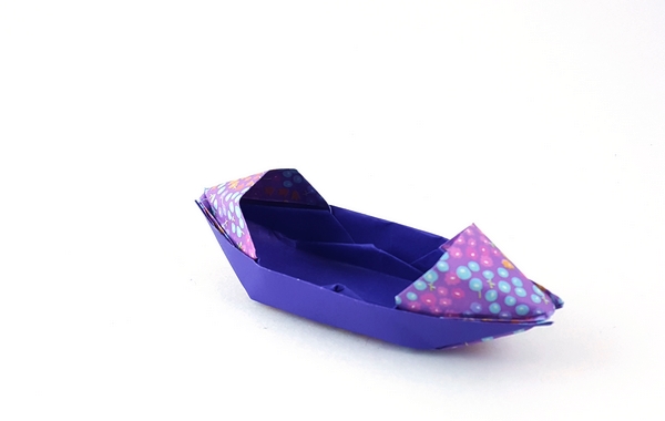 Origami Sampan by Traditional. Folded from a square of duo origami paper by Gilad Aharoni on giladorigami.com