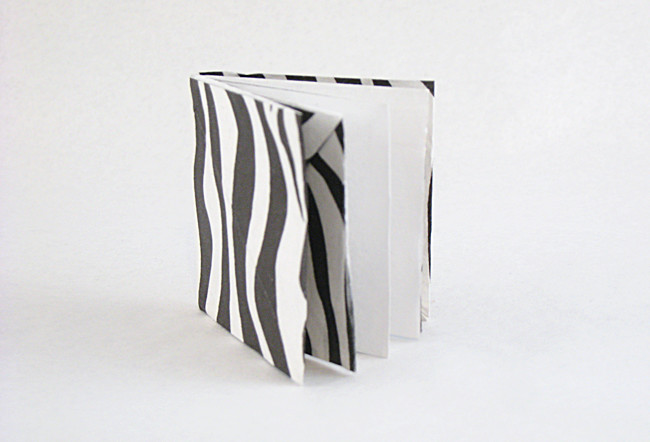 Origami Book by Jun Maekawa. Folded from a square of Kathy Stevick's tissue-foil by Gilad Aharoni on giladorigami.com