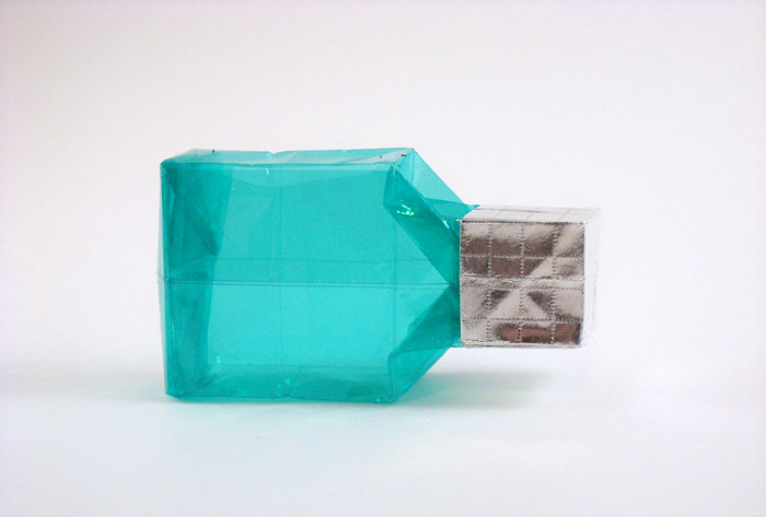 Origami Bottle by David Brill. Folded from a square of translucent origami paper. Cap folded from a square of foil by Gilad Aharoni on giladorigami.com