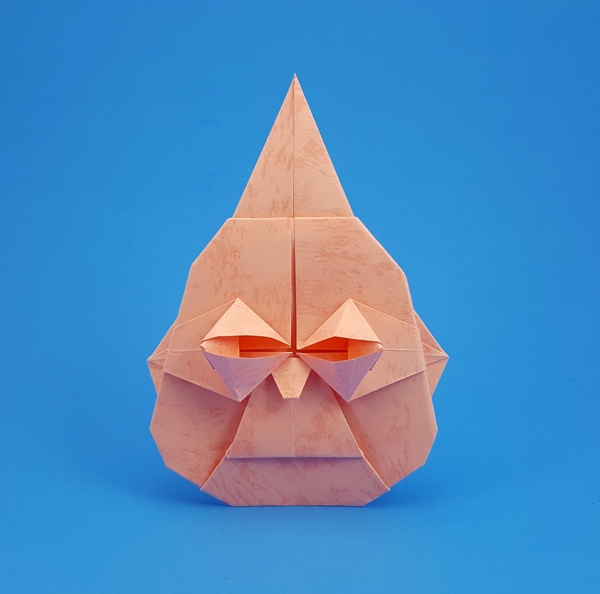 Origami Buddha's head by Nick Robinson. Folded from a square of textured origami paper by Gilad Aharoni on giladorigami.com