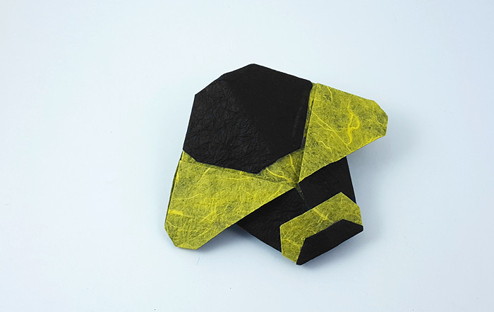 Origami Bumblebee by Marc Kirschenbaum. Folded from a square of Duo Thai origami paper by Gilad Aharoni on giladorigami.com