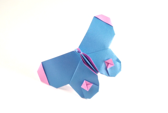 Origami Spotted butterfly by Stefan Delecat. Folded from a square of Jong Ie Nara pearl colored origami paper by Gilad Aharoni on giladorigami.com