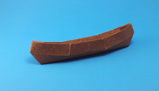 Origami Adirondack canoe by John Szinger. Folded from a square of speckle-design paper by Gilad Aharoni on giladorigami.com