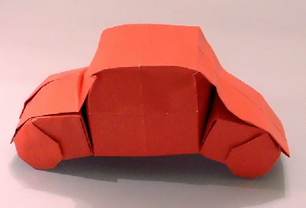 Origami Car by Juan Gimeno. Folded from a square of foil-backed paper by Gilad Aharoni on giladorigami.com