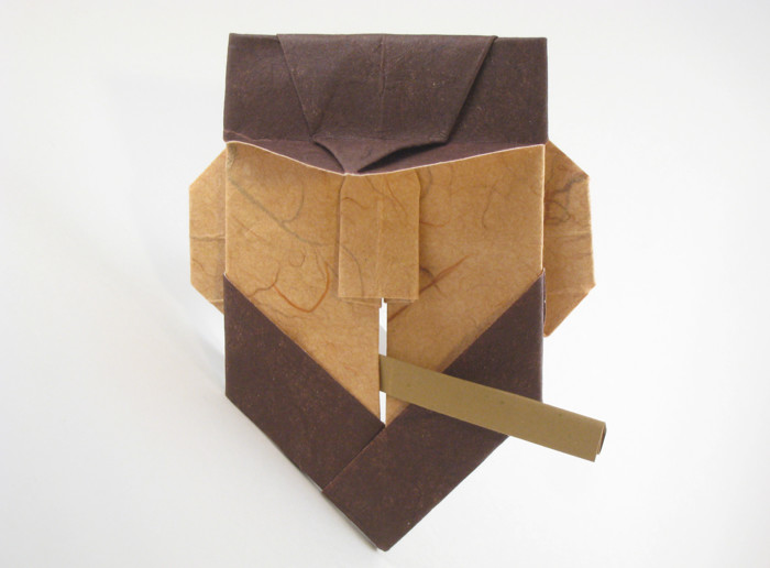 Origami Fidel Castro by Eric Kenneway. Folded from a rectangle of double-sided mulberry paper. Cigar folded from a rectangle of cigar paper by Gilad Aharoni on giladorigami.com