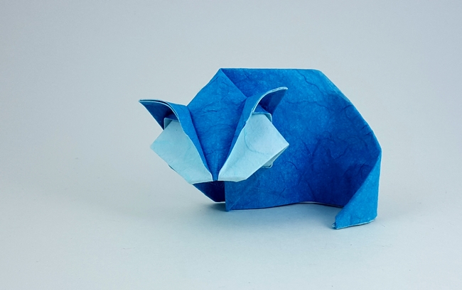 Origami Sleepy cat by Takai Hiroaki. Folded from a square of double-sided mulberry paper by Gilad Aharoni on giladorigami.com