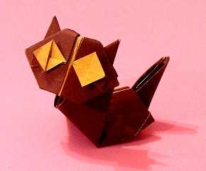 Origami Cat by Kunihiko Kasahara. Folded from a square of duo origami paper by Gilad Aharoni on giladorigami.com