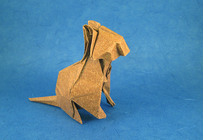 Origami Cat - seated by David Brill. Folded from a square of patterned origami paper by Gilad Aharoni on giladorigami.com