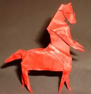 Origami Centaur by Jun Maekawa. Folded from a square of Golden River Leather paper by Gilad Aharoni on giladorigami.com