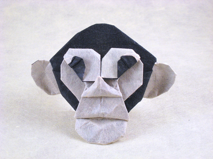 Origami Chimpanzee mask by John Richardson. Folded by Gilad Aharoni on giladorigami.com