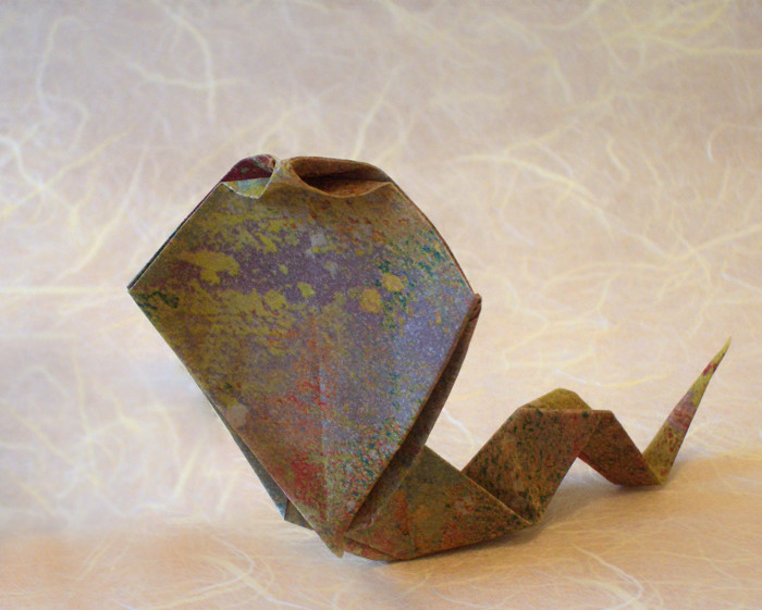 Origami Cobra by Kunihiko Kasahara. Folded from a square of patterned origami paper by Gilad Aharoni on giladorigami.com