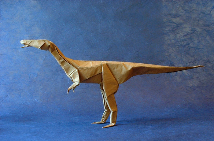 Origami Coelophysis by Satoshi Kamiya. Folded from a square of brown wrapping paper by Gilad Aharoni on giladorigami.com