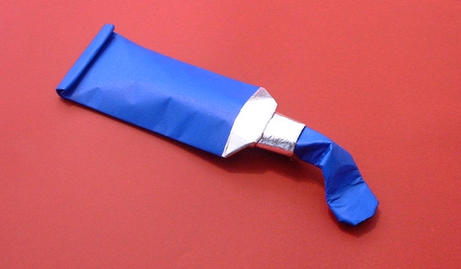 Origami Tube of paint by Guillaume Denis. Folded by Gilad Aharoni on giladorigami.com