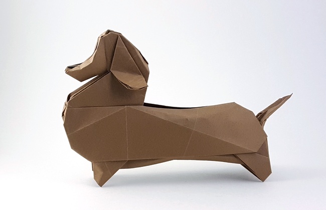 Origami Dachshund by Zhen-Ming Huang. Folded from a square of Tant paper by Gilad Aharoni on giladorigami.com
