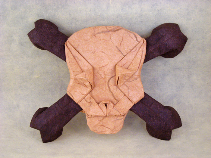 Origami Jolly Roger by Quentin Trollip. Wet-folded from a square of double-sided mulberry by Gilad Aharoni on giladorigami.com