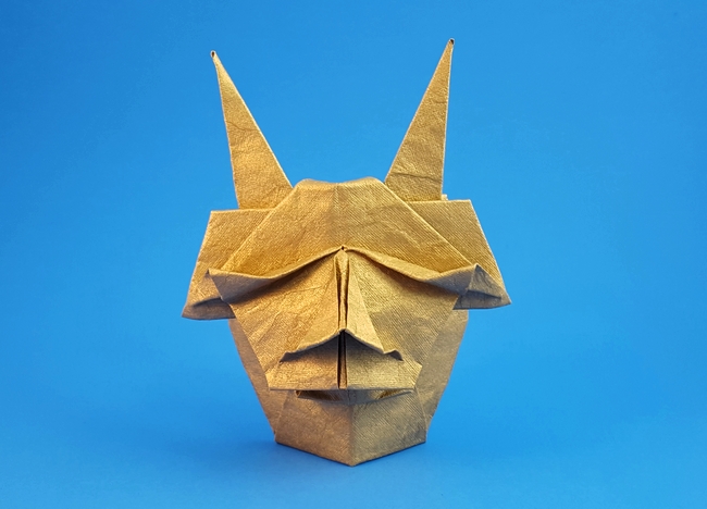 Origami Demon mask by Akira Yoshizawa. Folded from a square of India Gold paper by Gilad Aharoni on giladorigami.com