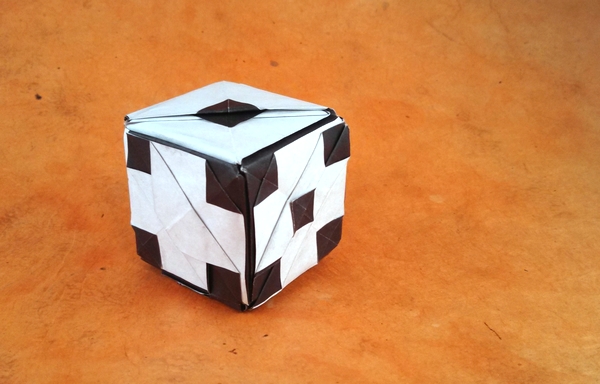 Origami Dice by Wayne Brown. Folded from 6 squares of origami paper by Gilad Aharoni on giladorigami.com