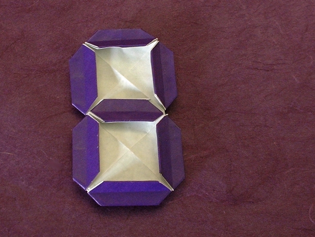 Origami Digital 7-segment by Ichiro Kinoshita. Folded from 2 squares of origami paper by Gilad Aharoni on giladorigami.com