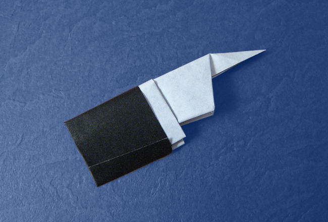 Origami Directional finger by Eric Kenneway. Folded from a rectangle of origami paper by Gilad Aharoni on giladorigami.com