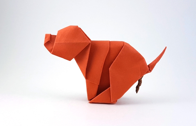 Origami Dog - pooping by Luis Fernandez Perez. Folded by Gilad Aharoni on giladorigami.com