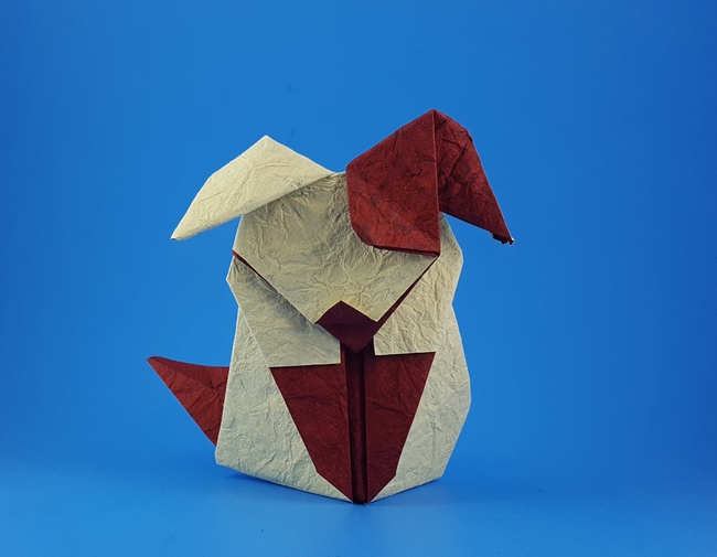 Origami Patch the dog by Roman Diaz. Folded from a square of Crinkle Red scrapbooking paper by Gilad Aharoni on giladorigami.com