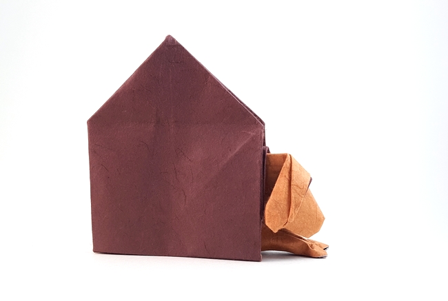 Origami Dog in doghouse by Patricia Crawford. Folded from a square of double-sided mulberry paper by Gilad Aharoni on giladorigami.com