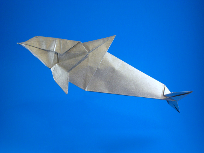 Origami Dolphin by Ryo Aoki. Folded from a square of Nicolas Terry's tissue-foil by Gilad Aharoni on giladorigami.com