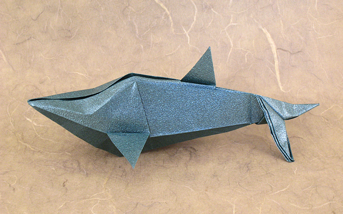 Origami Dolphin by Jun Maekawa. Folded from a square of textured origami paper by Gilad Aharoni on giladorigami.com