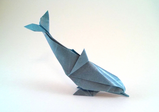 Origami Dolphin by Gerard Ty Sovann. Folded from a square of Nicolas Terry's tissue-foil by Gilad Aharoni on giladorigami.com