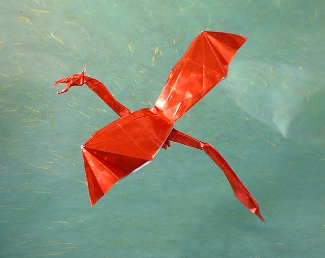 Origami Dragon in flight by Charles Esseltine. Folded from a square of Japanese foil by Gilad Aharoni on giladorigami.com