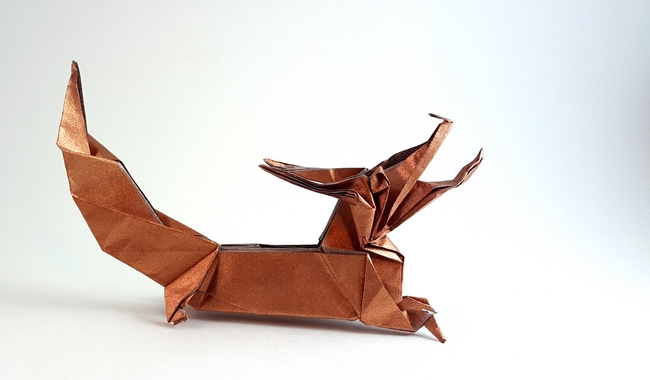 Origami Dragon by Kunihiko Kasahara. Folded from a square of Nicolas Terry's tissue-foil by Gilad Aharoni on giladorigami.com