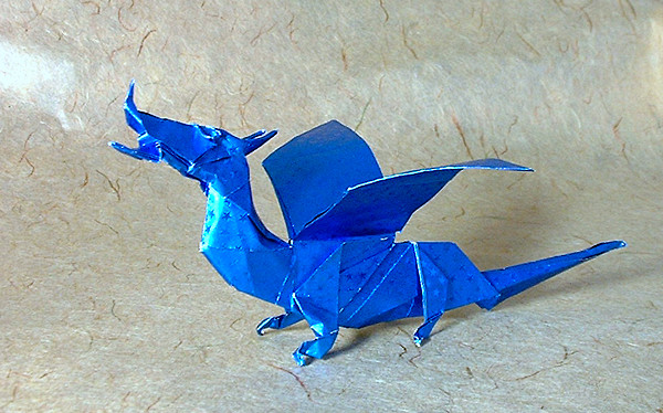 Origami Dragon by Fumiaki Kawahata. Folded from 3 squares of patterned foil by Gilad Aharoni on giladorigami.com