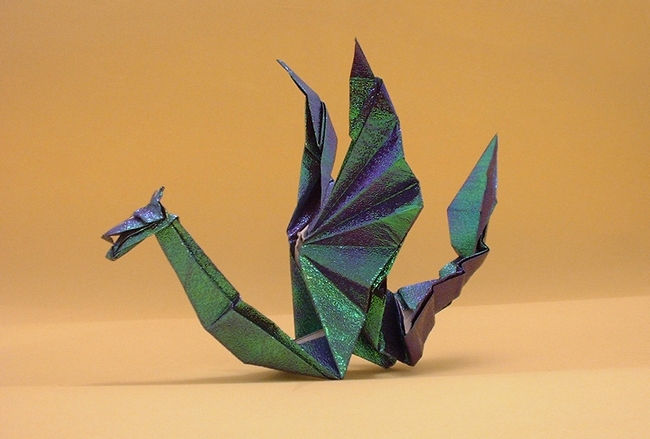 Origami Dragon by Tom Stamm. Folded from a square of holographic gift-wrap by Gilad Aharoni on giladorigami.com