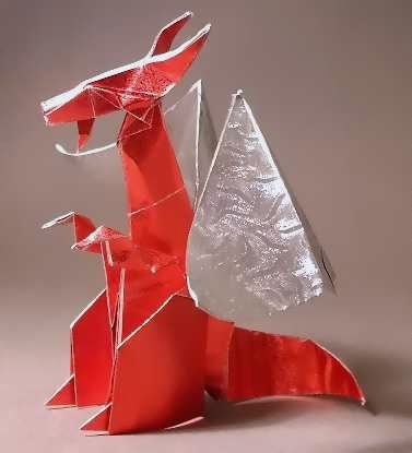 Origami Dragon by Hojyo Takashi. Folded from 3 squares of patterned foil by Gilad Aharoni on giladorigami.com