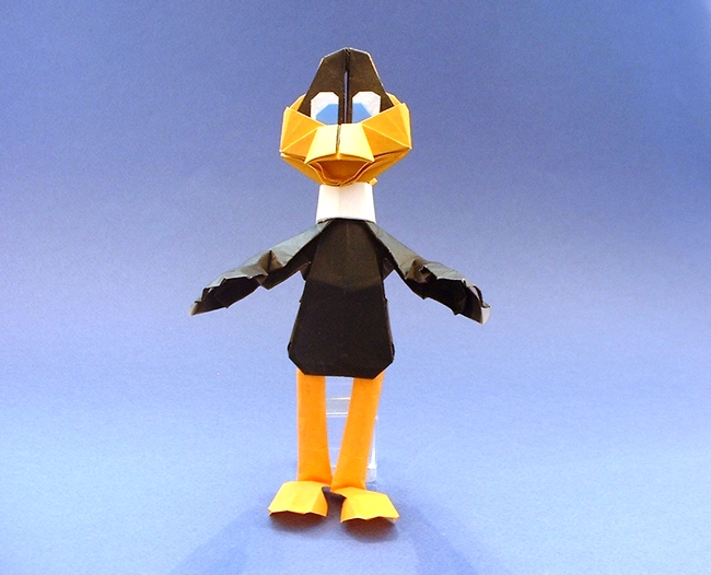 Origami Daffy Duck by Carlos Gonzalez Santamaria (Halle). Folded from 8 squares of origami paper by Gilad Aharoni on giladorigami.com