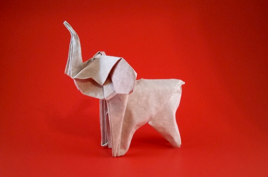 Origami Elephant by Gerard Ty Sovann. Wet-folded from a square of Astroparche crepe embossed cardstock by Gilad Aharoni on giladorigami.com