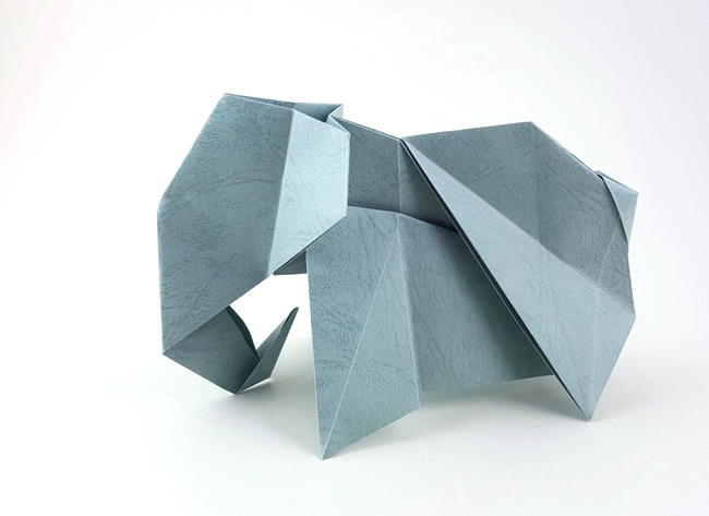 Origami Elephant by Gen Hagiwara. Folded from a square of Golden River Leather Paper by Gilad Aharoni on giladorigami.com