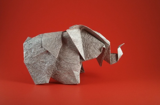 Origami Elephant - Cambodian by Fumiaki Kawahata. Folded from a square of Crinkle Silver scrapbooking paper by Gilad Aharoni on giladorigami.com