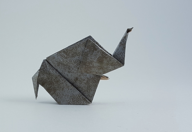 Origami Elephant by Michael G. LaFosse. Folded from a square of scrapbooking paper by Gilad Aharoni on giladorigami.com