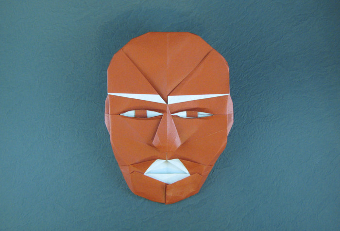 Origami Face by Fernando Gilgado Gomez. Folded from a square of origami paper by Gilad Aharoni on giladorigami.com