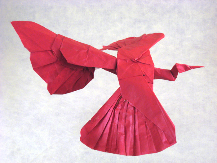 Origami Fire bird by Andrey Ermakov. Folded from a square of painted Trimaco masking-paper by Gilad Aharoni on giladorigami.com