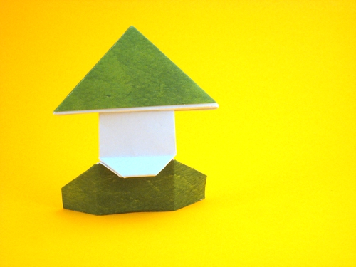 Origami Fisherman by David Petty. Folded from a rectangle of scrapbooking paper by Gilad Aharoni on giladorigami.com