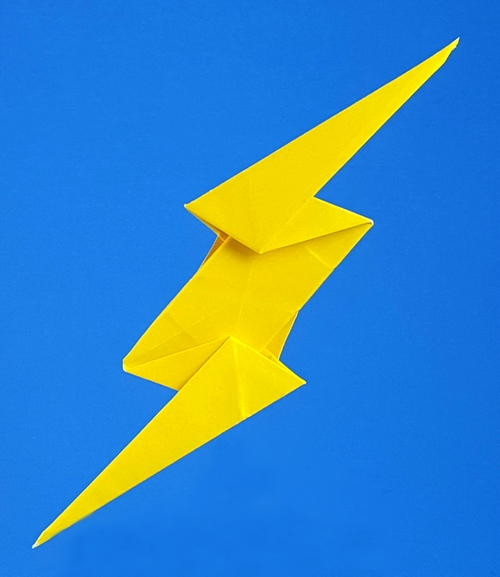 Origami The Flash symbol by John Montroll. Folded from a square of origami paper by Gilad Aharoni on giladorigami.com
